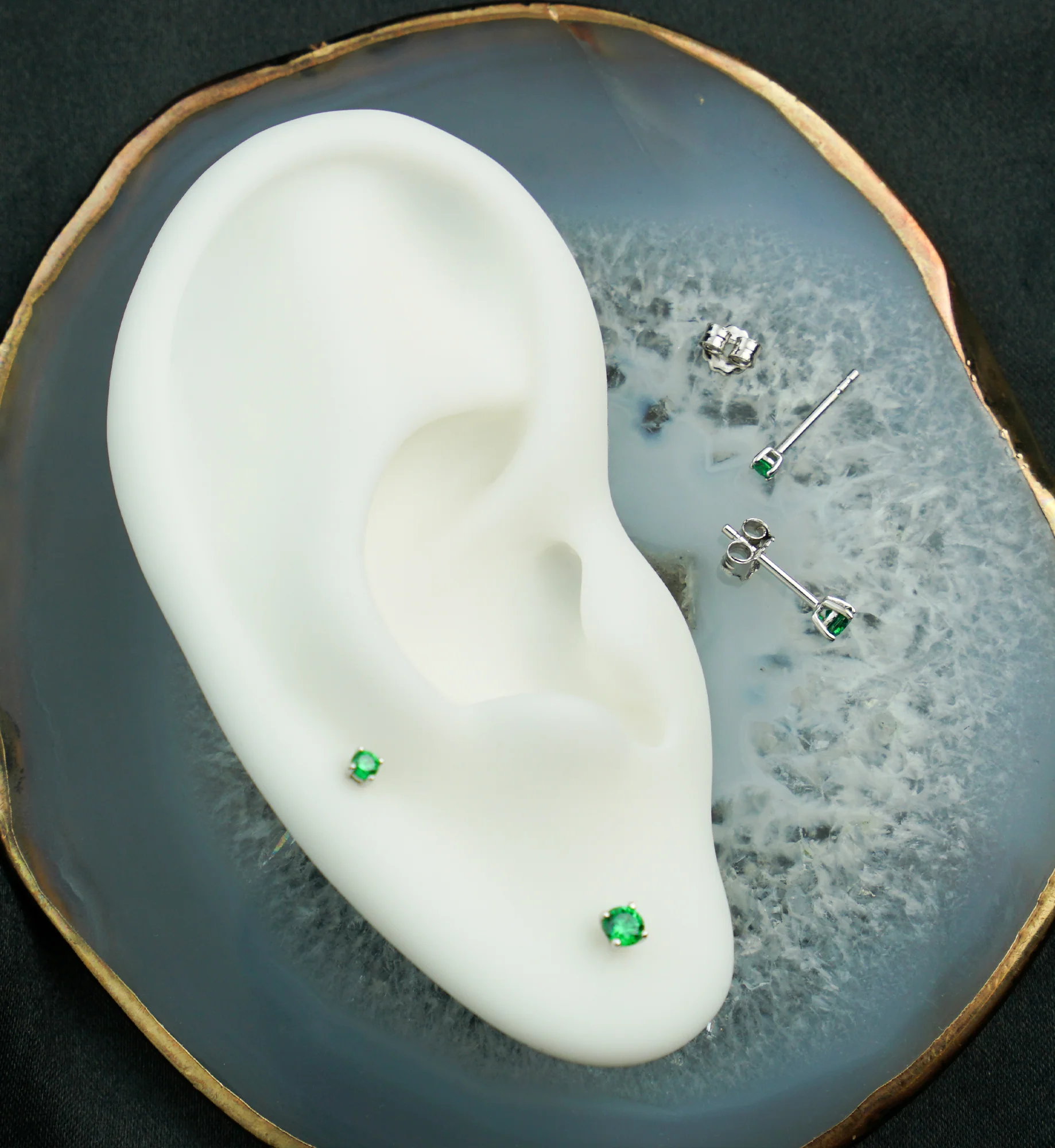 14kt White Gold May Birthstone Emerald CZ Stud Earrings - Image 2