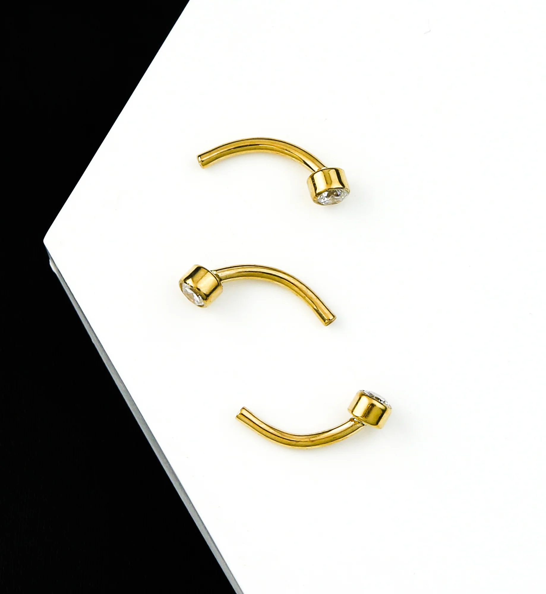 24kt Gold PVD Bezel Clear CZ Titanium Threadless Curved Barbell - Image 2