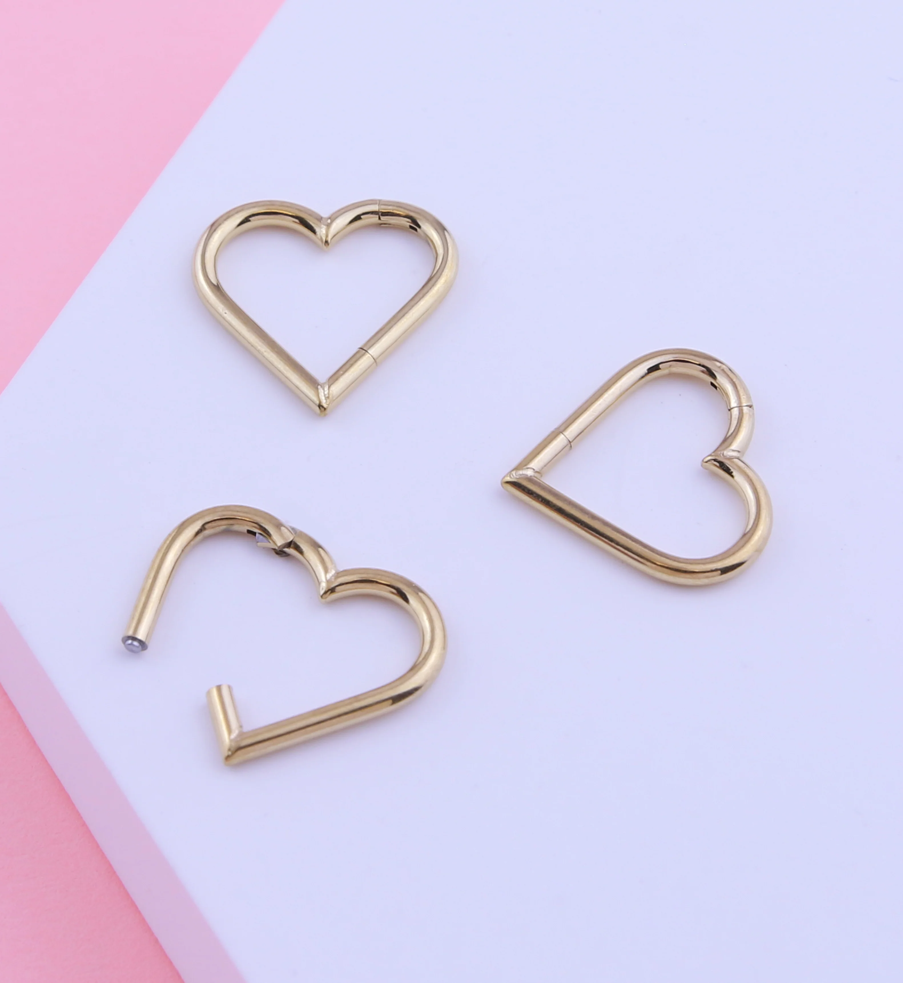 24kt Gold PVD Heart Titanium Hinged Segment Ring - Image 2